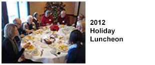 2012 Holiday Luncheon. Group of volunteers seated around a luncheon table.