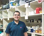 Smiling international man in Loan Closet.