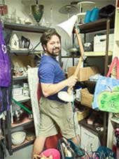 CCIS volunteer loading Loan Closet shelves.